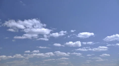 4K Cloudscape time-lapse, white clouds running across the blue sky. Vidéo 38136664