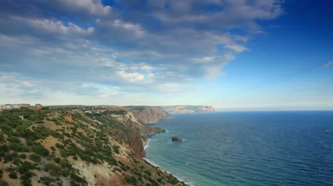 4K. Cloudy sky over the mountains and the sea. Cape Fiolent, Stock Footage 31647365