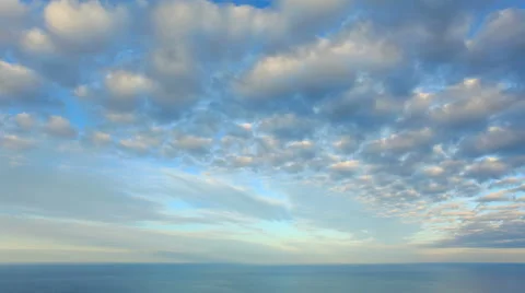 4K. Cloudy sky over the sea (Time Lapse). Ultra HD, 4096x2304. Stock Footage 44403361