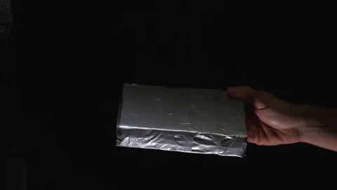 4K Cocain Brick Opening With Knife to Test the Drug Stock Footage 69798566
