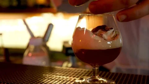 4k cocktail hot wiskey barman pouring whipped cream chocolate bar drink Stock Footage