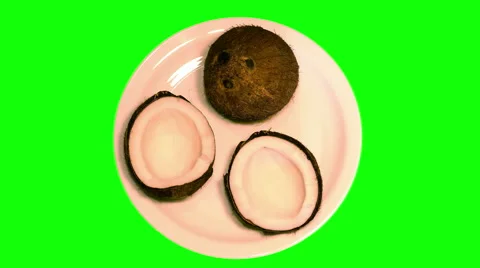 4k – Coconuts on plate Stock Footage 56457224