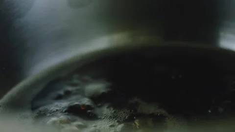 4K Cola Mixture Beginning to Simmer in a Metal Saucepan Video stock 342112919