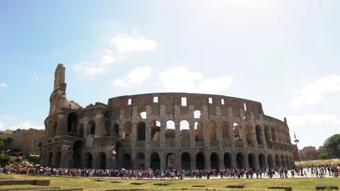 4k Coliseum with sun shining right above it in Rome Stock Footage 78029830