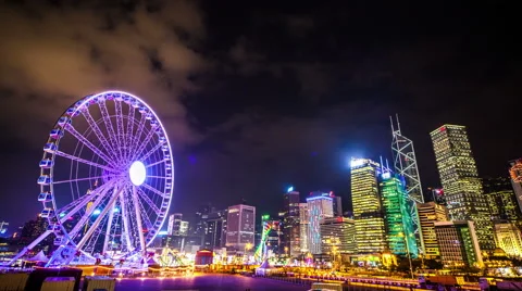 4k. Colorful Ferris wheel with a darkening sky. Hongkong. Timelapse Stock Footage 59147084