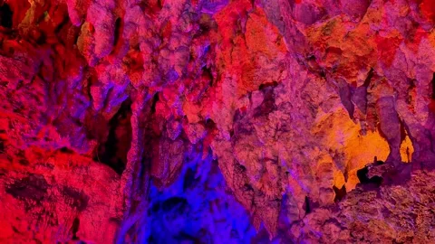 4K Colorfully Illuminated Limestone Formations Inside Cave Okinawa, Japan Stock Footage 345378097