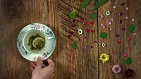 4k Colourful Composition of Fresh Green Tea - Wooden Background Video stock 66587859