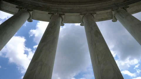 4k Columns against Blue Cloudy Sky Stock Footage 67823232