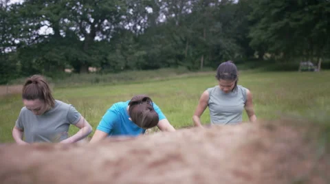 4K Competitive team in assault course race getting ready at the starting line Stock Footage 65797838