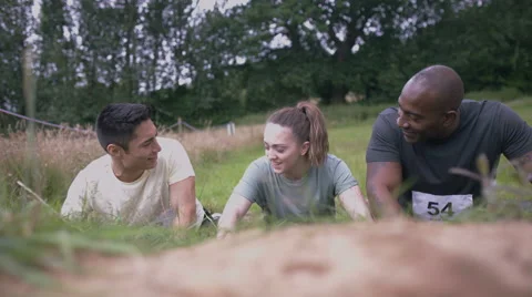4K Competitive team in assault course race getting ready at the starting line Stock Footage 65868615