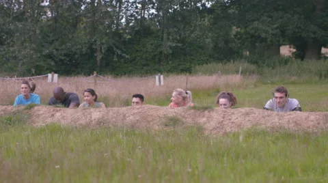 4K Competitive team in assault course race getting ready at the starting line Stock Footage 66050422