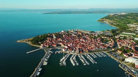 4K Compilation Video. Flight over old town Izola in Slovenia, aerial sunset view Video stock 85330132