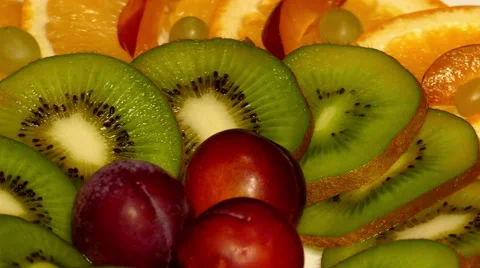 4k – Composition of fresh ripe fruit on plate 01 Stock Footage 55695878