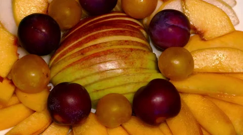 4k – Composition of fresh ripe fruit on plate 01 Stock Footage 55774831