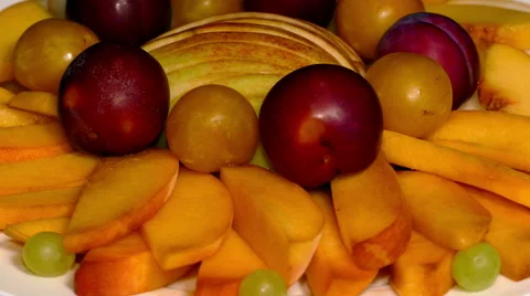 4k – Composition of fresh ripe fruit on plate 02 Stock Footage 55798650