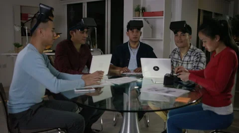 4K Computer programmers trying out virtual reality viewers Video stock 61719701