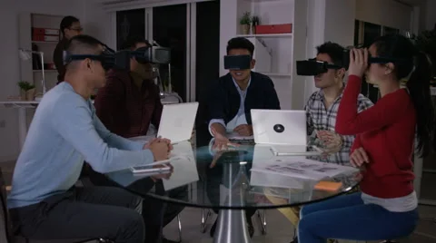 4K Computer programmers trying out virtual reality viewers Video stock 61720223