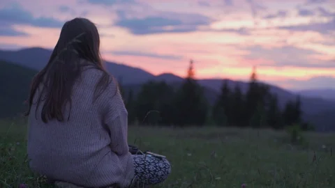 4K Concept view of lonely young attractive long-haired brunette girl in Stock Footage 119779914