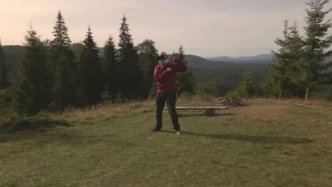 4K Conceptual aerial drone shot of young hairless man dancing alone during the Stock Footage 140274553