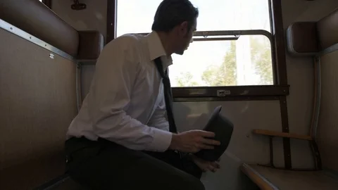 4K concerned passenger playing with his hat Stock Footage 90812987