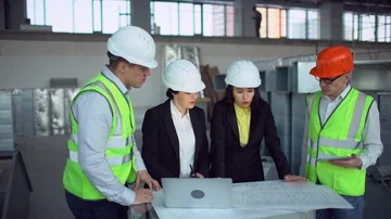 4k Confident female engineer or architect discussing construction issues with Stock Footage 85850336