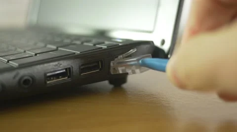 4K Connecting Ethernet Internet Cable to Laptop Computer 库存影片 50344537