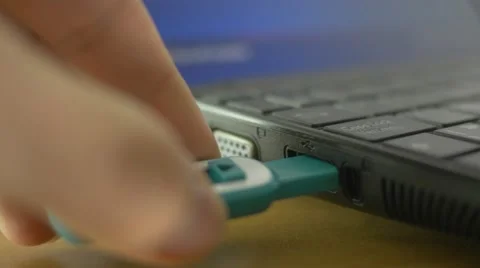 4K Connecting USB Drive Key in Laptop Po... | Stock Video | Pond5