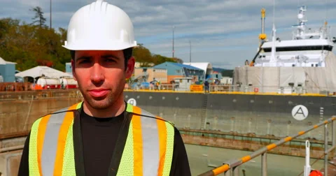 4K Construction Foreman with Hard Hat Smiles at Camera Stock Footage 50141054