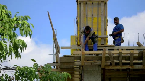 4K, Construction worker hitting a nail with hammer Stock Footage 53224758
