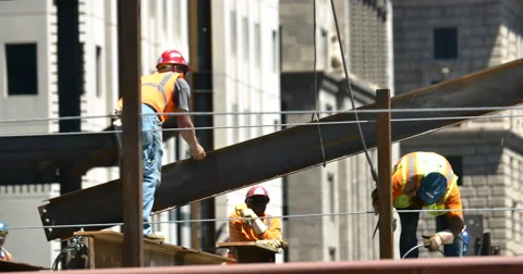 4K Construction workers Securing I-Beam Real Estate Part 1 Stock Footage 51059459