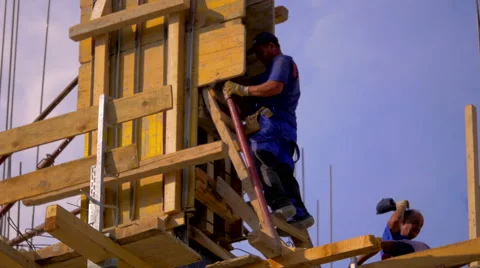 4K, Construction workers, working hard, sunset Stock Footage 53224852