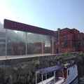 4k Container harbor panning shot with blending sun Flores island Indonesia 4k or 4k+ Resolution