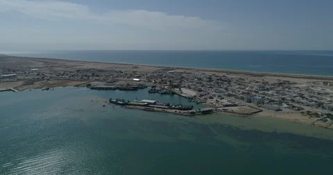 4K Container ships - fixed in the port of Bautino Kazakhstan on the shores of Stock Footage 104022002