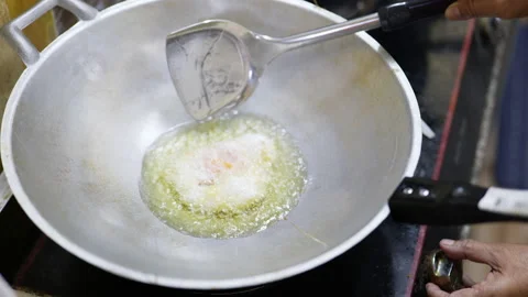 4K Cooking fried egg . Stock Footage 229826739
