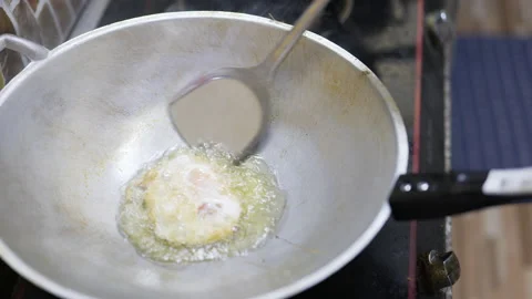 4K Cooking fried egg . Stock Footage 229826781