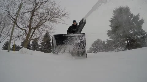 4k cool view of snowblower coming close to camera Stock Footage 46500771