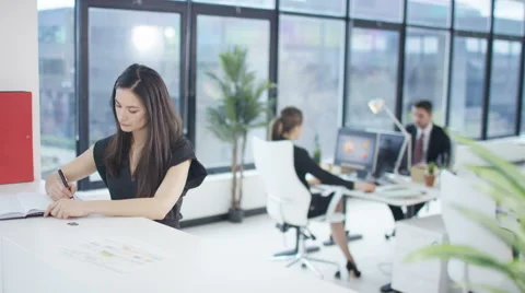 4K Corporate business group working together in modern city office Stock Footage