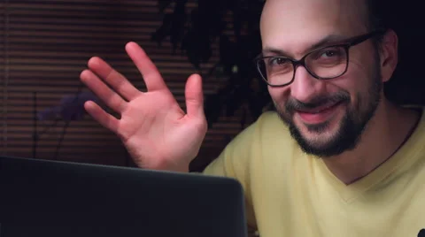 4K Corporate Shot of a Business Man Working on Computer and Waving Happy Stock Footage