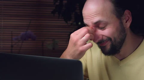 4K Corporate Shot of a Business Man Working on Computer Being Tired Stock Footage