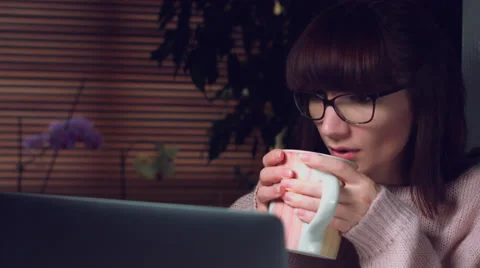4K Corporate Shot of a Business Woman Working on Computer and Drinking tea Stock Footage