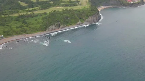 4K Counter-clockwise Aerial View of Gaetkkak Columnar Jointing, Jeju Island Stock Footage 143863175
