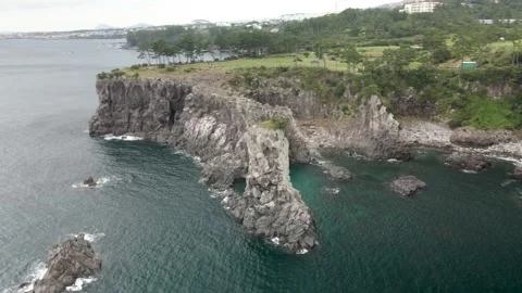 4K Counter-clockwise Drone Shot of Oedolgase (외돌개), Jeju Volcanic Island Stock Footage 143863720