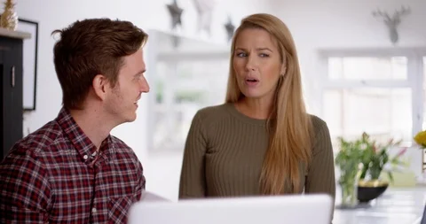 4K Couple arguing about their finances, man accusing his partner of overspending Stock Footage 113994533
