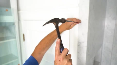 4K Craftsman gently using a hammer and chisel on marble bath Video stock 141580981