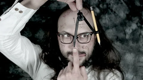 4k Crazy Professor Science Man Playing with Compasses Stock Footage 67407958
