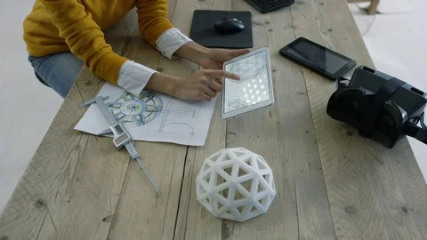 4K Creative team creating 3D printed objects &amp; checking design on computers Stock Footage 73853058