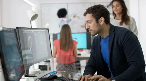 4K Creative technology designers working on computer, designing smart watch Stock Footage 61356765