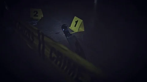 4K Crime Scene Flashlight on Do Not Cross Tape Stock Footage 72289581