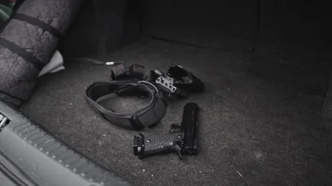 4k Crime Shot of Tools and Weapons in the Car Boot Stock Footage 321865488