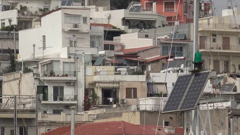 4K Crowded suburb area in Athens city building green house solar panel eco power Vídeos de archivo 78713203